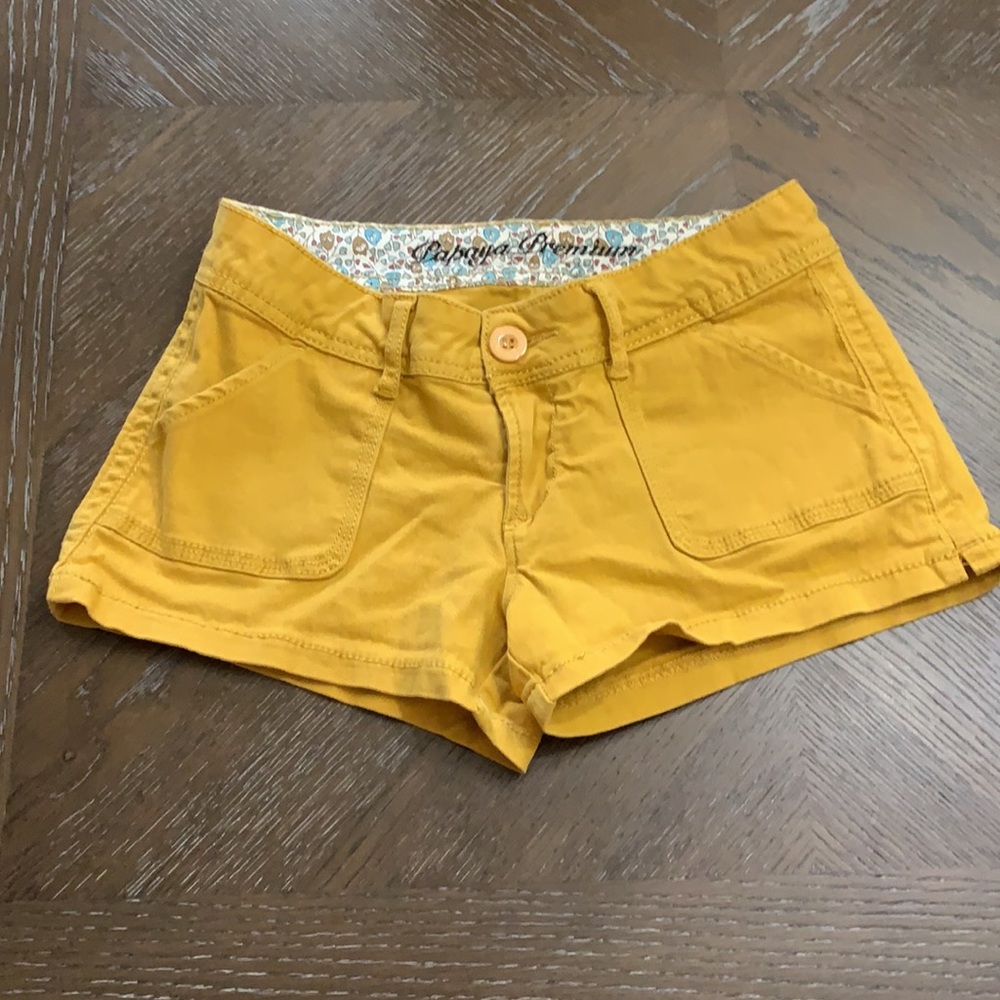 Papaya Premium golden yellow 2.5” low waisted shorts.